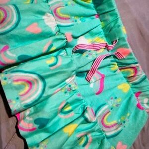 Excellent condition with floral design skirt